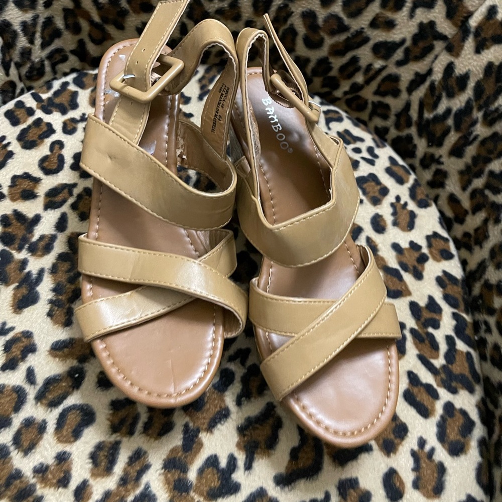 Tan size 6.5 wedges, shoes, in good condition and items is  as is